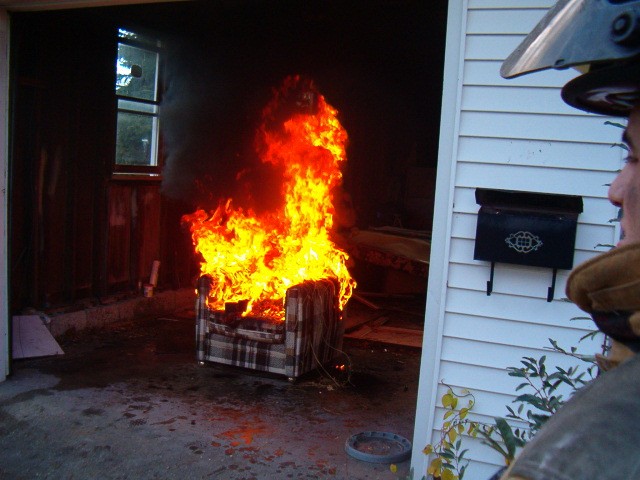 Chair fire at Westerly house, amazingly put out with a 15lb water can.